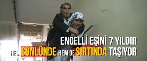 Engelli eşini 7 yıldır gönlünde ve sırtında taşıyor