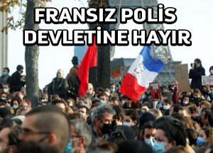 Onbinler polis kimliğinin saklanmasını öngören Fransız tasarısına karşı yürüdü